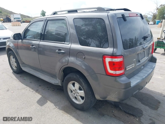 2010 Ford Escape XLT with VIN 1FMCU0D73AKC67711, listed as a IAAI auction lot 41891915 with 254,378 mi miles. Bid and sale history available at carsss.com. Image 3.