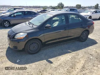 2009 Toyota Yaris z VIN JTDBT903091299267, wystawiony jako Copart lot #58272545 z przebiegiem 199 062 mil mil oraz Szkoda całkowita • Salvage title. Historia ofert i sprzedaży dostępna na DreamBid. Obrazek 1.
