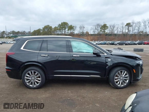 2021 Cadillac XT6 Premium Luxury with VIN 1GYKPCRSXMZ222454, listed as a IAAI auction lot 41648439 with 113,547 mi miles and . Bid and sale history available at carsss.com. Image 13.