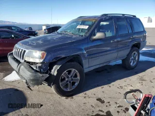 2004 Jeep Grand Cherokee Laredo with VIN 1J4GW48S44C325808, listed as a Copart auction lot 89351575 with 312,011 mi miles and Salvage Title. Bid and sale history available at carsss.com. Image 1.