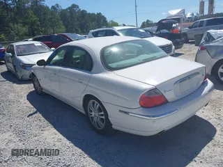 2003 Jaguar S-Type with VIN SAJEA01U93HM89560, listed as a IAAI auction lot 42115289 with 236,905 mi miles and . Bid and sale history available at DreamBid. Image 3.