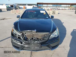 2016 Mercedes-Benz E-Class E 400 with VIN WDDKJ6HB9GF331994, listed as a IAAI auction lot 41953303 with 97,378 mi miles. Bid and sale history available at carsss.com. Image 12.