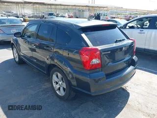 2011 Dodge Caliber Mainstreet with VIN 1B3CB3HA9BD120950, listed as a IAAI auction lot 42150354 with 103,015 mi miles. Bid and sale history available at carsss.com. Image 3.