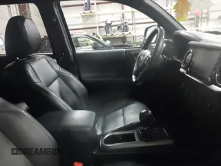 2021 Toyota Tacoma SR z VIN 3TMCZ5AN2MM444249, wystawiony jako IAAI lot #41942146 z przebiegiem 59 429 mil mil oraz . Historia ofert i sprzedaży dostępna na DreamBid. Obrazek 5.