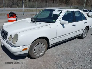 1999 Mercedes-Benz E-Class with VIN WDBJF82H4XX025925, listed as a IAAI auction lot 41839398 with 238,583 mi miles. Bid and sale history available at carsss.com. Image 21.