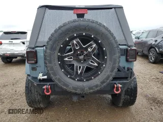 2014 Jeep Wrangler Sport с VIN 1C4AJWAG1EL117219, выставлен на аукционе Copart как лот 59696355 с пробегом 105 865 миль миль и Списание • Salvage title. История ставок и продаж доступна на DreamBid. Изображение 6.