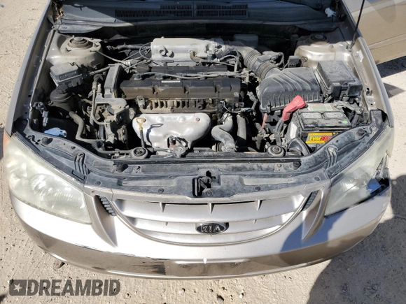 2006 Kia Spectra EX with VIN KNAFE121565364950, listed as a Copart auction lot 48860895 with 209,615 mi miles and Salvage Title. Bid and sale history available at DreamBid. Image 11.