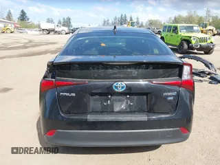 2021 Toyota Prius L Eco with VIN JTDKAMFU3M3140233, listed as a IAAI auction lot 42182685 with 38,842 mi miles and . Bid and sale history available at DreamBid. Image 17.