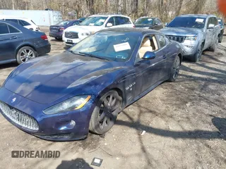 2012 Maserati GranTurismo S with VIN ZAM45KLA8C0065892, listed as a IAAI auction lot 41877800 with 86,813 mi miles. Bid and sale history available at carsss.com. Image 2.