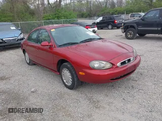 1999 Mercury Sable GS with VIN 1MEFM50U4XG622650, listed as a IAAI auction lot 42099721 with 86,899 mi miles. Bid and sale history available at carsss.com. Image 1.