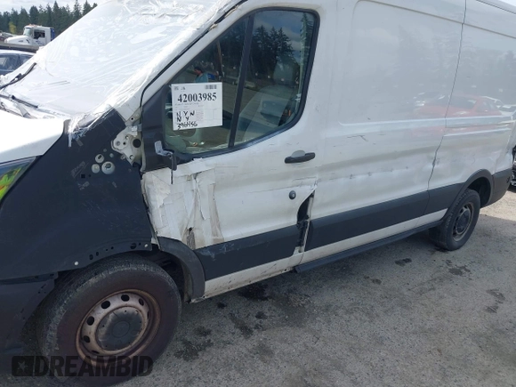 2019 Ford Transit z VIN 1FTBW2CM0KKB30319, wystawiony jako IAAI lot #42003985 z przebiegiem 396 456 mil mil oraz . Historia ofert i sprzedaży dostępna na DreamBid. Obrazek 6.