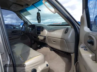 2003 Ford F-150 XLT with VIN 1FTRW07L53KD82167, listed as a IAAI auction lot 41745801 with 216,783 mi miles. Bid and sale history available at carsss.com. Image 5.