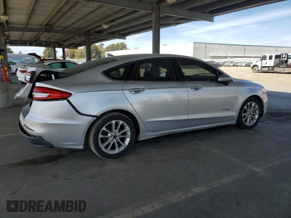 2019 Ford Fusion Hybrid SE with VIN 3FA6P0LU7KR262160, listed as a Copart auction lot 51969555 with 99,699 mi miles and Salvage Title. Bid and sale history available at carsss.com. Image 3.