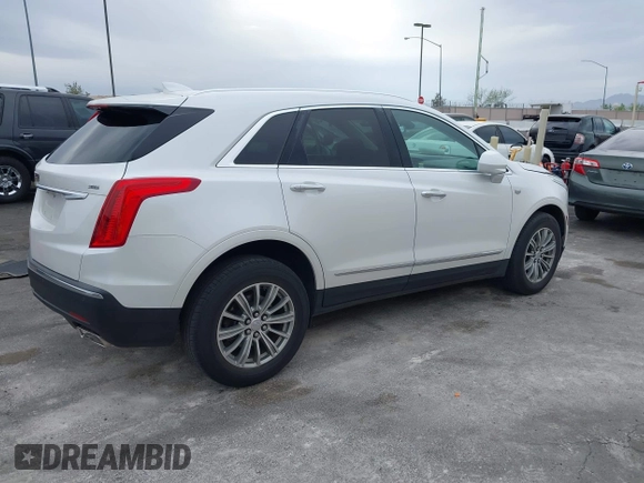 2018 Cadillac XT5 Luxury FWD with VIN 1GYKNCRS2JZ185644, listed as a IAAI auction lot 41912079 with 82,728 mi miles and . Bid and sale history available at carsss.com. Image 4.