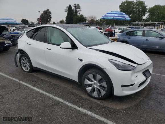 2023 Tesla Model Y Long Range with VIN 7SAYGDEE2PF624598, listed as a Copart auction lot 47851465 with 18,474 mi miles and Salvage Title. Bid and sale history available at carsss.com. Image 4.