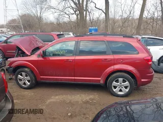 2011 Dodge Journey Mainstreet with VIN 3D4PG1FG5BT517517, listed as a IAAI auction lot 41676503 with 173,836 mi miles and . Bid and sale history available at DreamBid. Image 14.