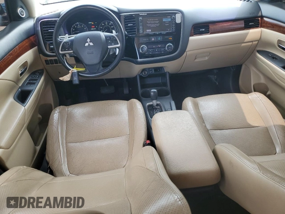 2014 Mitsubishi Outlander GT z VIN JA4JZ4AX7EZ017369, wystawiony jako Copart lot #54223775 z przebiegiem 131 555 mil mil oraz Szkoda całkowita • Salvage title. Historia ofert i sprzedaży dostępna na DreamBid. Obrazek 8.