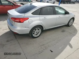 2016 Ford Focus SE with VIN 1FADP3F28GL270003, listed as a Copart auction lot 51852715 with 157,665 mi miles and Salvage Title. Bid and sale history available at DreamBid. Image 3.