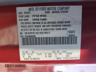 2001 Ford Focus ZX3 z VIN 3FAFP31331R219011, wystawiony jako Copart lot #56032315 z przebiegiem 365 925 mil mil oraz Szkoda całkowita • Salvage title. Historia ofert i sprzedaży dostępna na DreamBid. Obrazek 12.