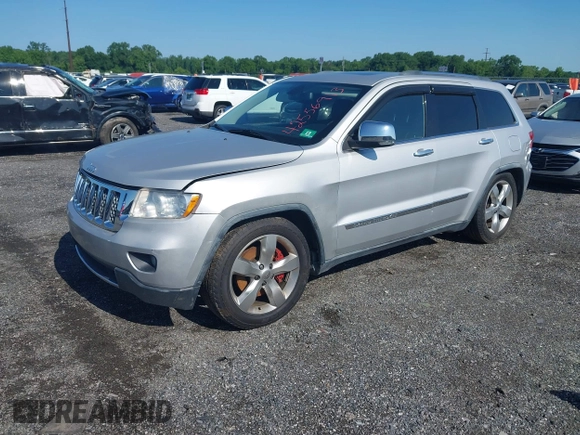 2011 Jeep Grand Cherokee Overland Summit with VIN 1J4RR6GT9BC535985, listed as a IAAI auction lot 42556913 with 108,845 mi miles and . Bid and sale history available at DreamBid. Image 17.