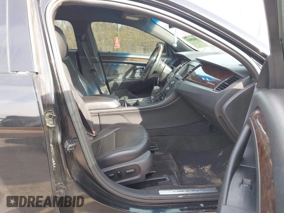 2013 Ford Taurus Limited with VIN 1FAHP2F80DG114817, listed as a IAAI auction lot 41865803 with 207,132 mi miles. Bid and sale history available at carsss.com. Image 5.