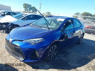 2017 Toyota Corolla L with VIN 2T1BURHE0HC937580, listed as a IAAI auction lot 40591004 with 112,411 mi miles and . Bid and sale history available at DreamBid. Image 20.