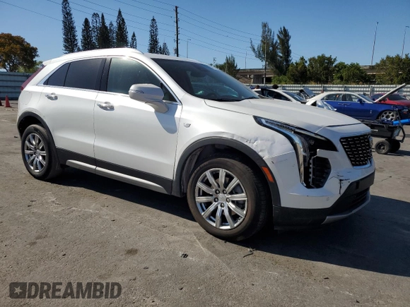 2022 Cadillac XT4 FWD Premium Luxury with VIN 1GYFZCR45NF100049, listed as a Copart auction lot 50213255 with 62,391 mi miles and Salvage title. Bid and sale history available at DreamBid. Image 4.