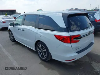 2023 Honda Odyssey Touring with VIN 5FNRL6H8XPB038875, listed as a IAAI auction lot 42441076 with 13,947 mi miles and . Bid and sale history available at DreamBid. Image 3.