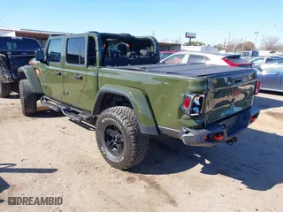 2022 Jeep Gladiator Mojave with VIN 1C6JJTEG5NL110886, listed as a IAAI auction lot 41410576 with 44,307 mi miles. Bid and sale history available at carsss.com. Image 3.