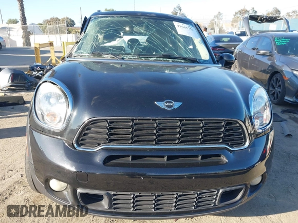 2013 MINI Countryman S z VIN WMWZC3C57DWP22928, wystawiony jako IAAI lot #41665753 z przebiegiem Nie podano mil oraz . Historia ofert i sprzedaży dostępna na DreamBid. Obrazek 12.