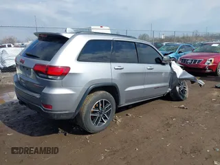 2021 Jeep Grand Cherokee Trailhawk with VIN 1C4RJFLG6MC683973, listed as a IAAI auction lot 41662344 with 95,890 mi miles. Bid and sale history available at carsss.com. Image 4.