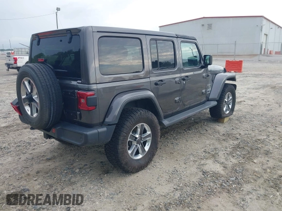 2018 Jeep Wrangler Unlimited Sahara with VIN 1C4HJXEN8JW303023, listed as a IAAI auction lot 42138631 with 72,463 mi miles and . Bid and sale history available at DreamBid. Image 4.