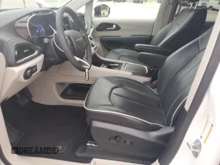 2023 Chrysler Pacifica Hybrid Limited with VIN 2C4RC1S70PR543587, listed as a Copart auction lot 60439795 with 11,558 mi miles and Salvage title. Bid and sale history available at DreamBid. Image 7.