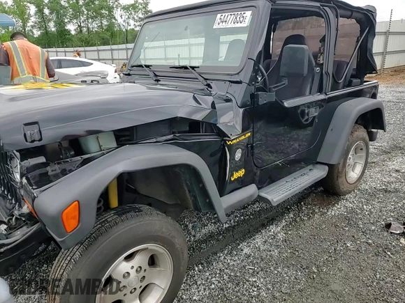 2002 Jeep Wrangler Sport with VIN 1J4FA49S12P730135, listed as a Copart auction lot 54477835 with 148,153 mi miles and Salvage title. Bid and sale history available at DreamBid. Image 14.