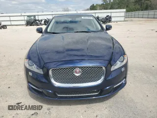 2015 Jaguar XJ Portfolio with VIN SAJWJ2GD8F8V84252, listed as a Copart auction lot 49313935 with 90,545 mi miles and Salvage title. Bid and sale history available at DreamBid. Image 5.