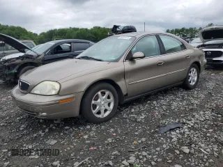 2002 Mercury Sable LS Premium с VIN 1MEFM55S32G642873, выставлен на аукционе Copart как лот 64901415 с пробегом 140 749 миль миль и Чистый • Clean title. История ставок и продаж доступна на DreamBid. Изображение 1.