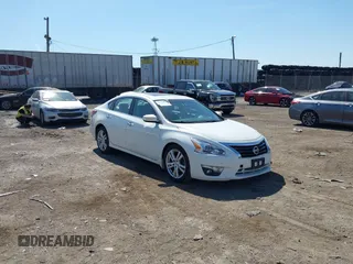 2015 Nissan Altima SL z VIN 1N4BL3AP2FC571645, wystawiony jako IAAI lot #42095010 z przebiegiem 124 881 mil mil oraz . Historia ofert i sprzedaży dostępna na DreamBid. Obrazek 1.