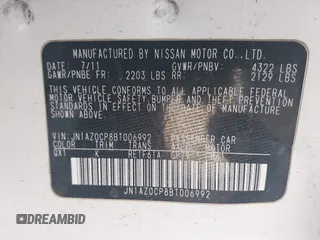 2011 Nissan LEAF SL-e with VIN JN1AZ0CP8BT006992, listed as a IAAI auction lot 41097604 with 98,688 mi miles. Bid and sale history available at carsss.com. Image 9.