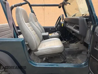1995 Jeep Wrangler S with VIN 1J4FY19PXSP218282, listed as a Copart auction lot 63527435 with 160,957 mi miles and Clean title. Bid and sale history available at DreamBid. Image 5.