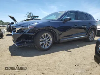 2021 Mazda CX-9 Grand Touring z VIN JM3TCBDY6M0520443, wystawiony jako Copart lot #57403735 z przebiegiem 31 414 mil mil oraz Szkoda całkowita • Salvage title. Historia ofert i sprzedaży dostępna na DreamBid. Obrazek 1.