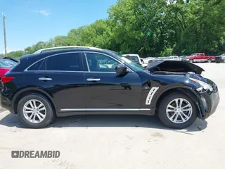 2015 Infiniti QX70 with VIN JN8CS1MW1FM482625, listed as a IAAI auction lot 42332365 with 88,912 mi miles and . Bid and sale history available at DreamBid. Image 13.