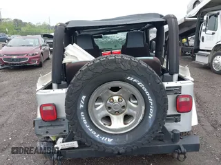 2003 Jeep Wrangler X with VIN 1J4FA39S13P363135, listed as a IAAI auction lot 42275729 with 178,138 mi miles and . Bid and sale history available at DreamBid. Image 16.