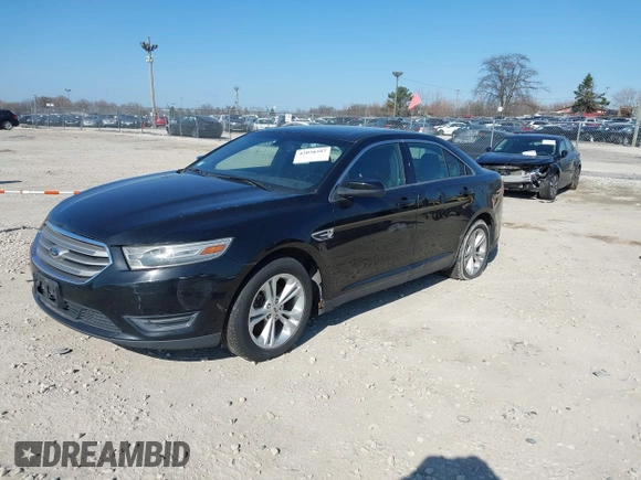 2013 Ford Taurus SEL with VIN 1FAHP2E96DG148836, listed as a IAAI auction lot 42030387 with 192,218 mi miles and . Bid and sale history available at carsss.com. Image 2.
