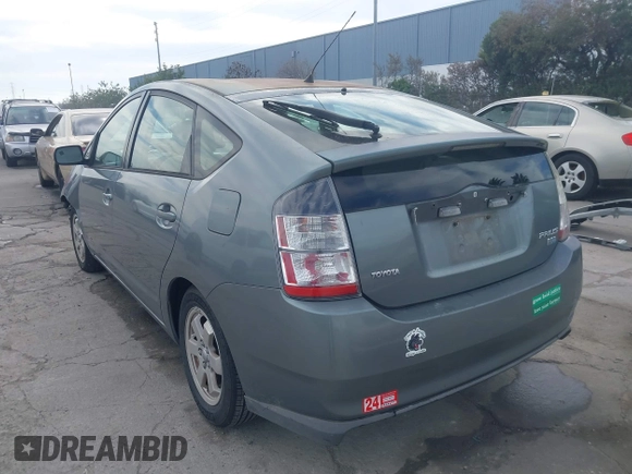 2005 Toyota Prius z VIN JTDKB20UX53123196, wystawiony jako IAAI lot #41626598 z przebiegiem 216 895 mil mil oraz . Historia ofert i sprzedaży dostępna na DreamBid. Obrazek 3.