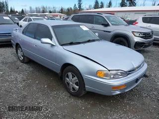 1996 Toyota Camry DX with VIN JT2BG12K2T0396941, listed as a IAAI auction lot 41593032 with 205,514 mi miles. Bid and sale history available at carsss.com. Image 1.