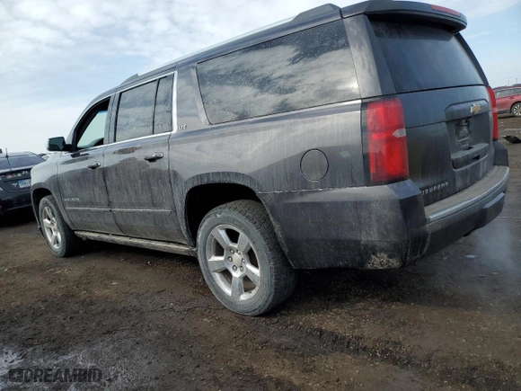 2015 Chevrolet Suburban LTZ with VIN 1GNSKKKCXFR722917, listed as a Copart auction lot 46176815 with 116,660 mi miles and Salvage Title. Bid and sale history available at carsss.com. Image 2.