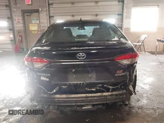 2023 Toyota Corolla Hybrid LE with VIN JTDBDMHE3P3001608, listed as a IAAI auction lot 41589154 with 58,632 mi miles. Bid and sale history available at carsss.com. Image 17.