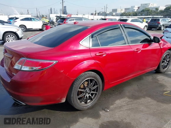 2009 Mazda 6 S Grand Touring with VIN 1YVHP82B795M34101, listed as a IAAI auction lot 41434441 with 125,481 mi miles and . Bid and sale history available at DreamBid. Image 4.