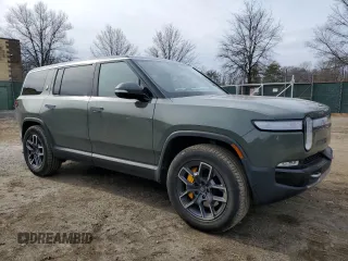 2022 Rivian R1S Launch Edition z VIN 7PDSGABL4NN000393, wystawiony jako Copart lot #44218005 z przebiegiem 26 598 mil mil oraz Szkoda całkowita • Salvage title. Historia ofert i sprzedaży dostępna na DreamBid. Obrazek 4.