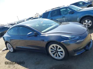 2021 Tesla Model 3 Long Range with VIN 5YJ3E1EB9MF997442, listed as a IAAI auction lot 41759875 with 87,059 mi miles. Bid and sale history available at carsss.com. Image 12.